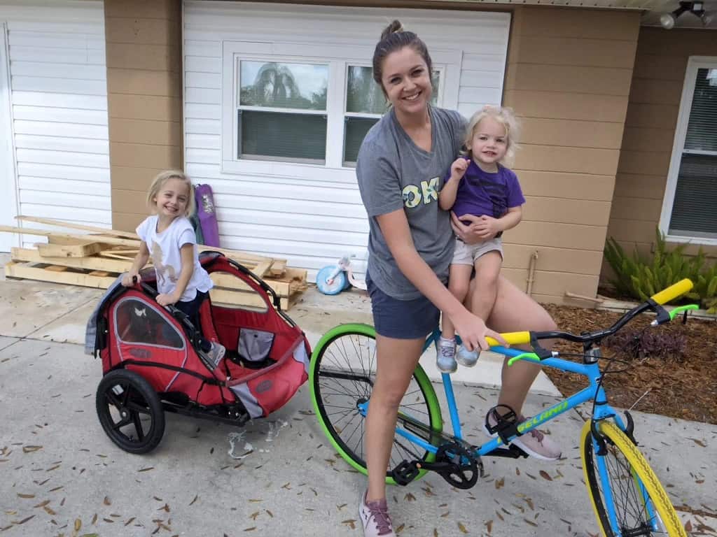 Kelcey and daughters with new bike